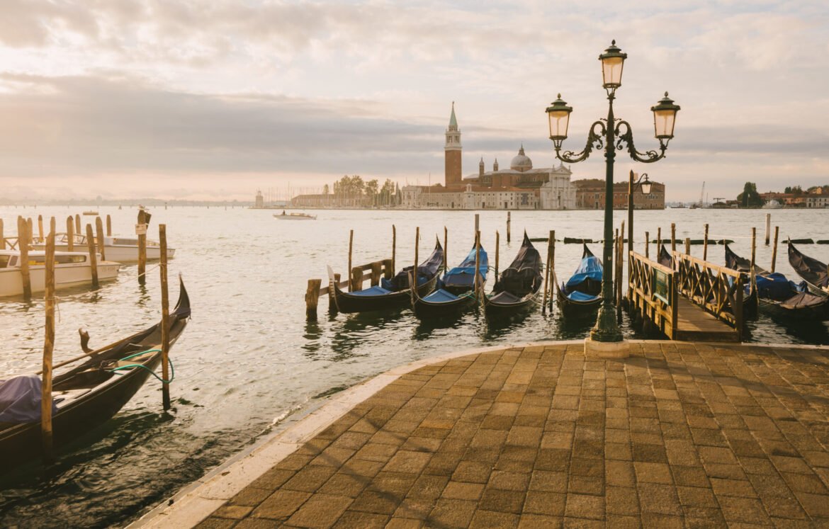 Gondolas in Grand Canal, San Giorgio Maggiore Island in background, Venice, Italy
