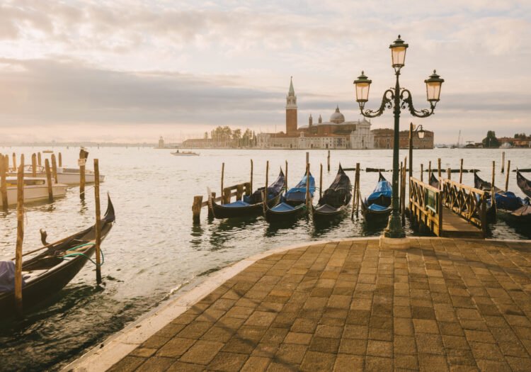 Gondolas in Grand Canal, San Giorgio Maggiore Island in background, Venice, Italy