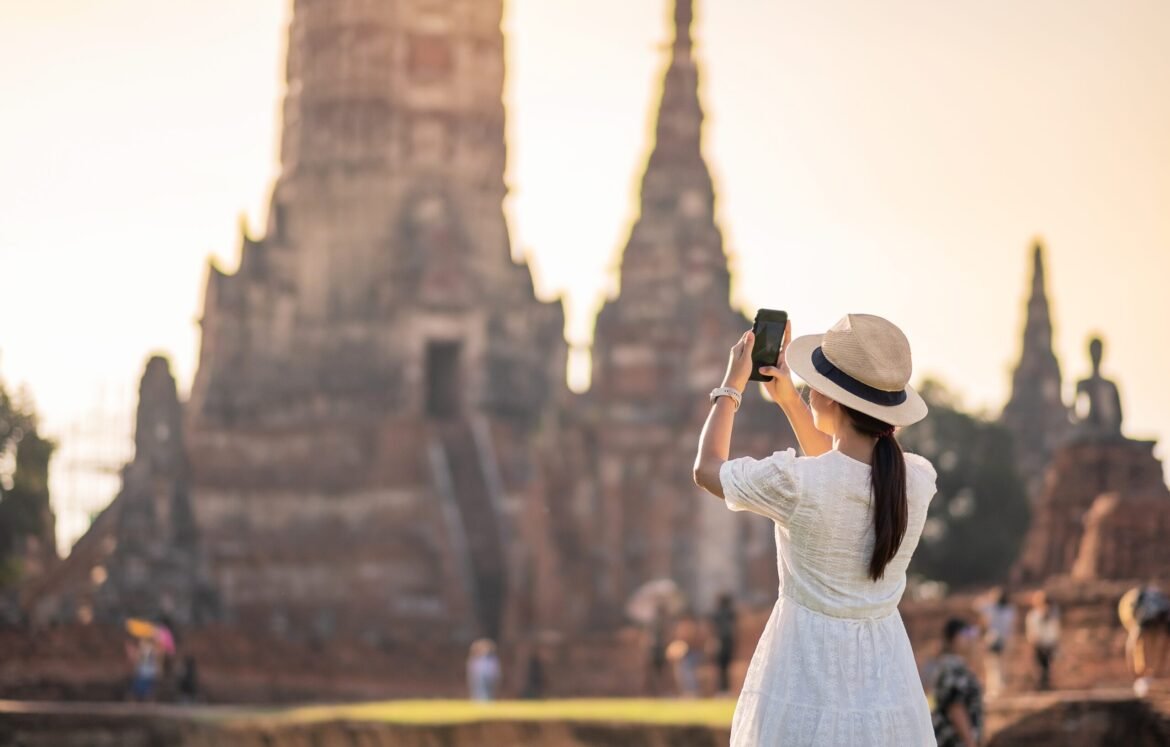 woman-taking-photo-by-smartphone-2025-03-08-14-20-05-utc