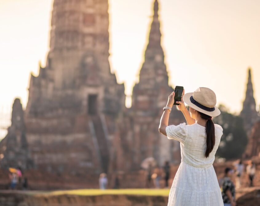 woman-taking-photo-by-smartphone-2025-03-08-14-20-05-utc