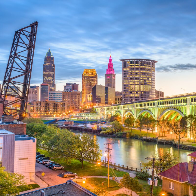 Cleveland, Ohio, USA city skyline over the Cuyahoga River.