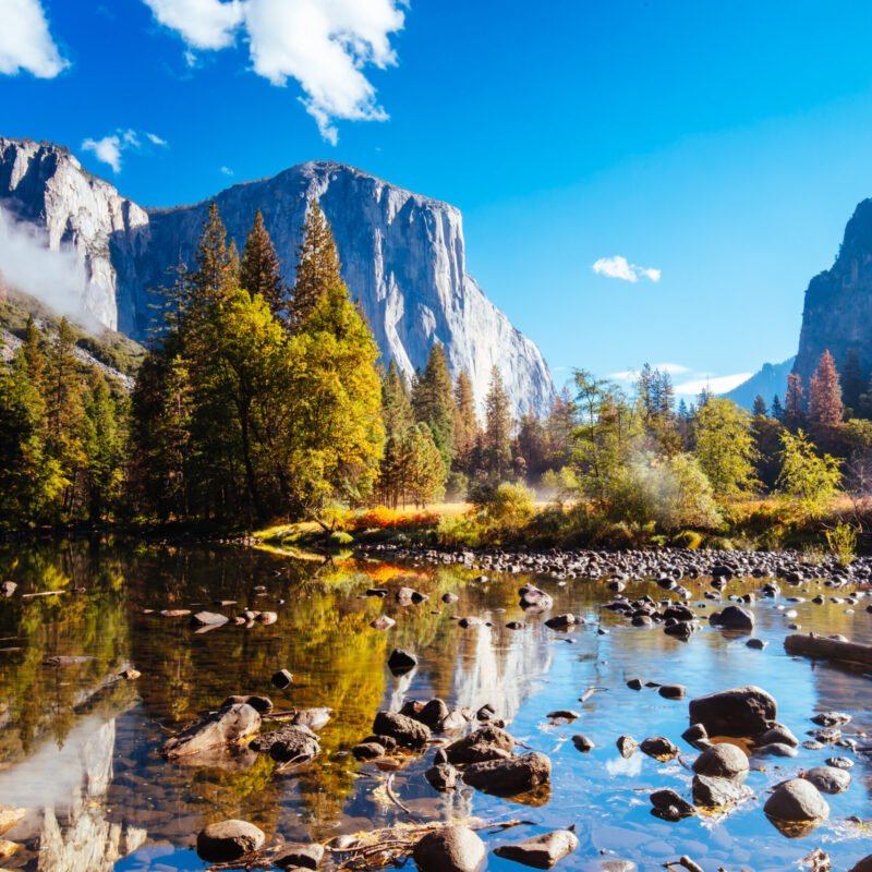 The view from within Yosemite Valley and Northside Drive of surrounding rock faces on a sunny autumn morning in California, USA